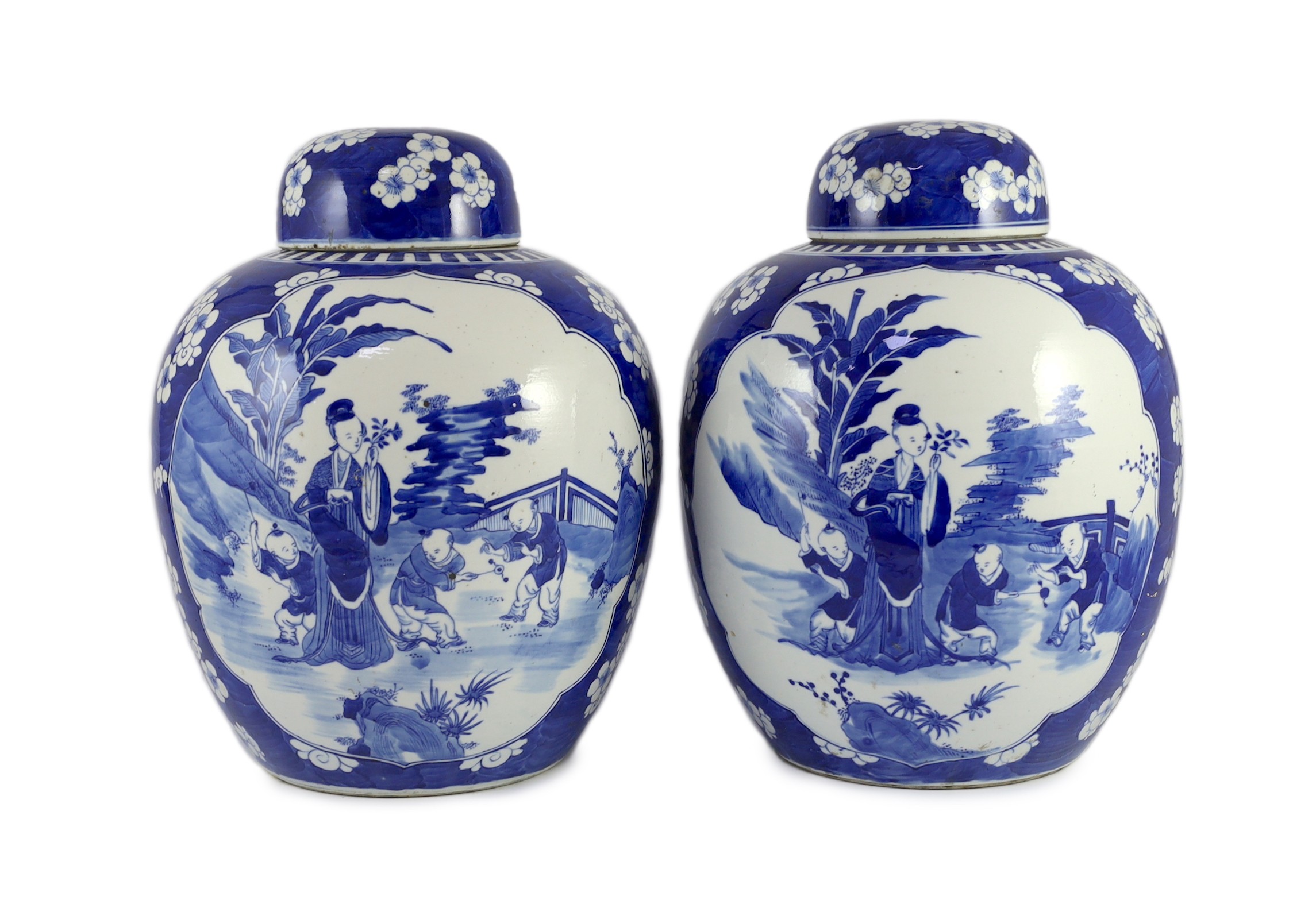 A pair of large Chinese blue and white jars and covers, 19th century, 33cm high
